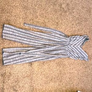 The color is a grey and the lines and design is black very soft and comfortable